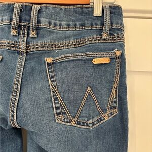 Wrangler boot cut jeans size 5/6, but fit more like a 4, inseam 32. Barely worn